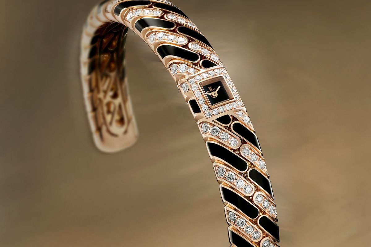 Jaeger-LeCoultre Calibre 101 Chain high jewellery watch featuring an 18-carat pink-gold bangle with black HyCeram and diamonds.