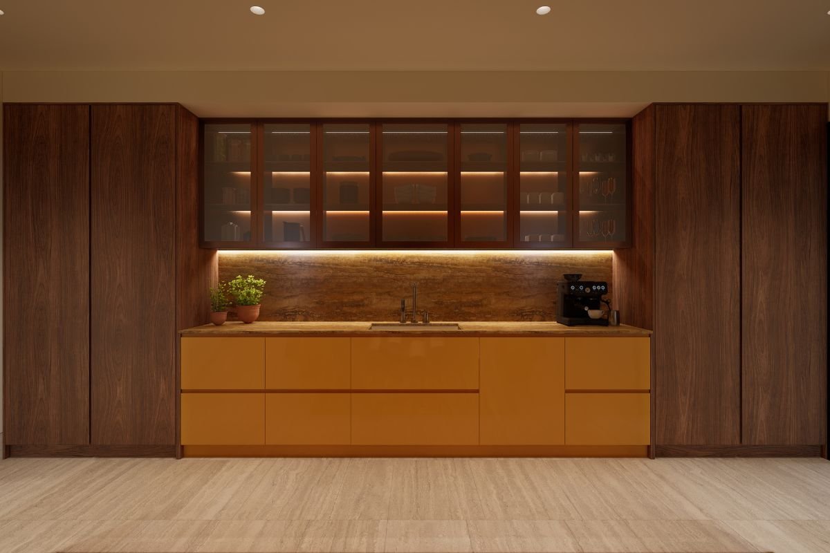 Modern kitchen design featuring illuminated glass cabinets, wood panelling and a stone worktop.