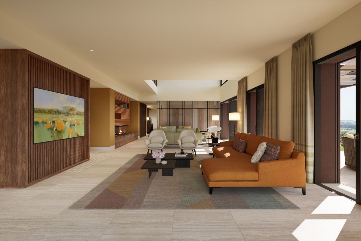 Spacious open-plan living area featuring contemporary furniture, natural wood detailing and doors opening onto a terrace.