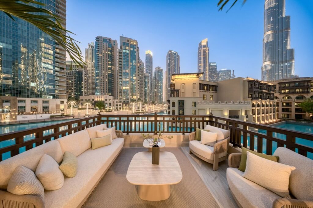 Furnished terrace at the Wilben and Valouran townhouse overlooking Downtown Dubai, with the Burj Khalifa in the background.