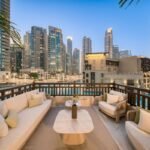 Furnished terrace at the Wilben and Valouran townhouse overlooking Downtown Dubai, with the Burj Khalifa in the background.